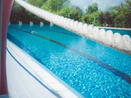 View through a lifebuoy into the pool