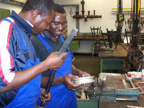 Two men in a workshop