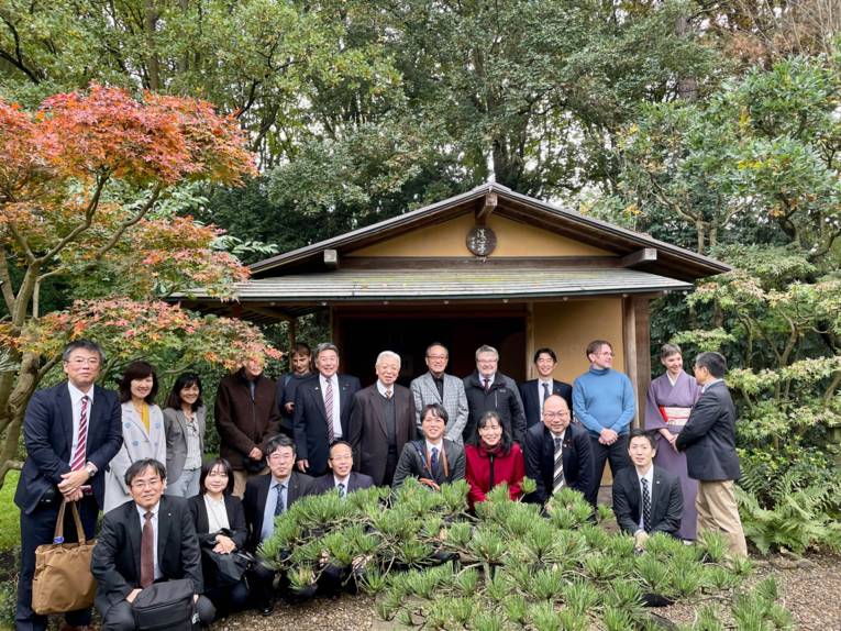 A delegation in a park.
