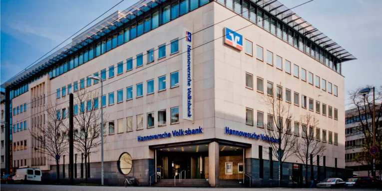 A modern office building on a street.