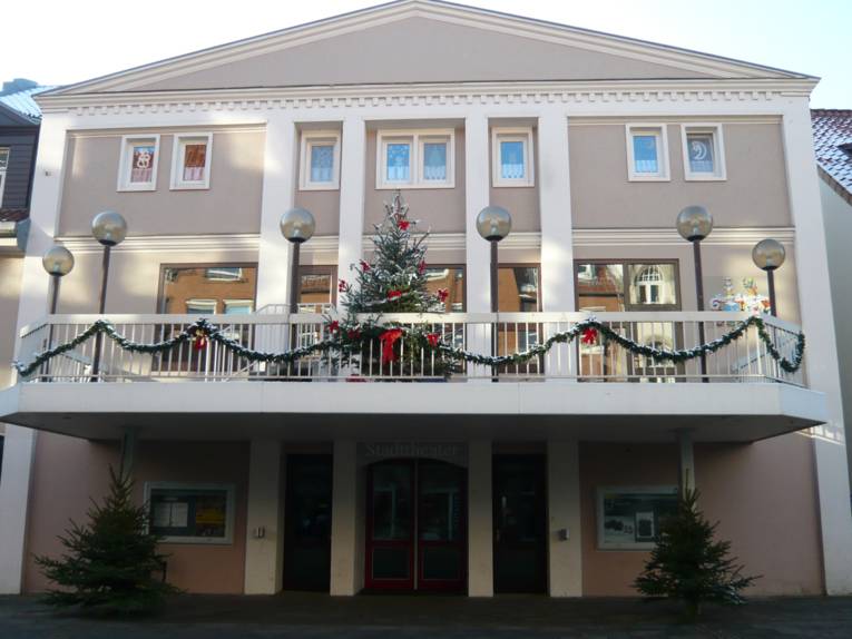 An older building with a large balcony.