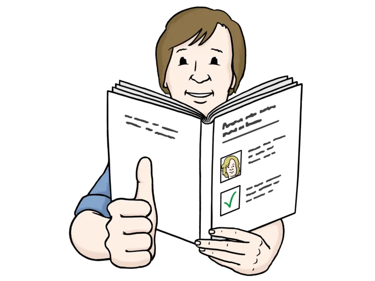 A man looks into a book.
